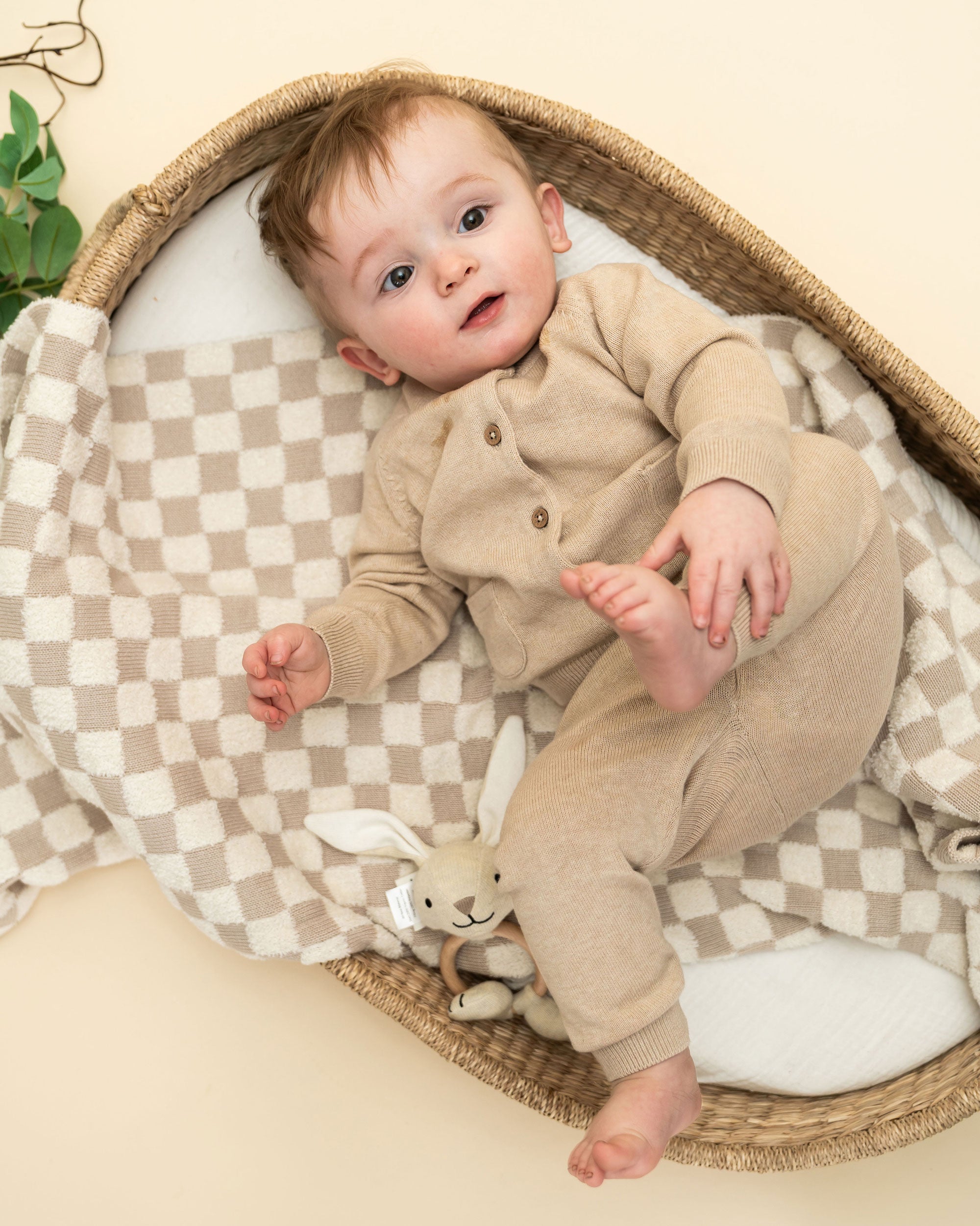 Natural Heather Bunny - Organic Stuffed Animal Baby Ring Rattle with model wearing Viverano Milan outfit