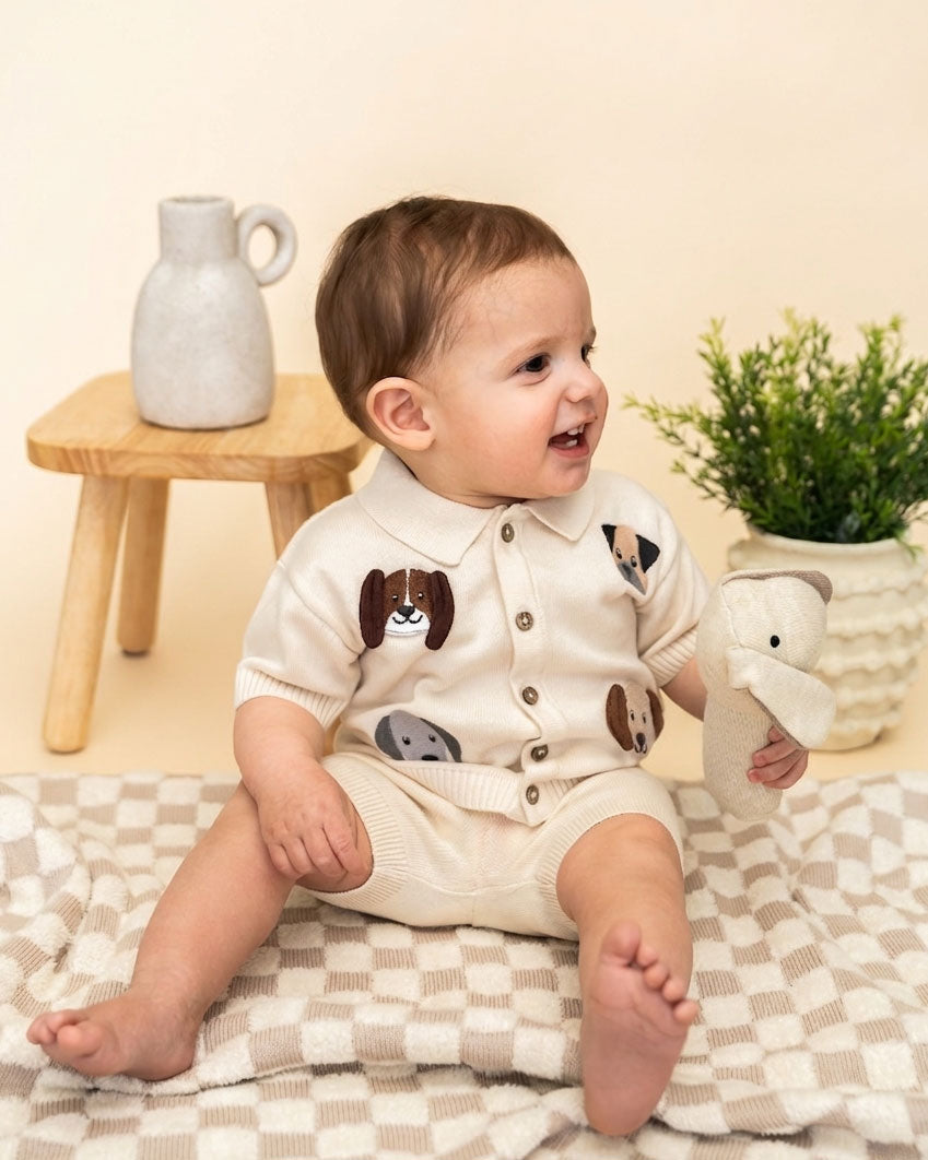 Baby playing with Dog - Organic Stuffed Animal Baby Stick Rattle Toy