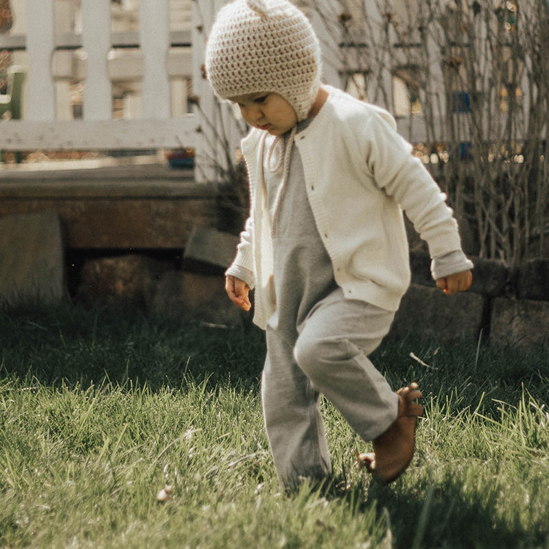 Dove White Viverano Organic Cotton Knit Button Cardigan Sweater for Babies, Model Walking