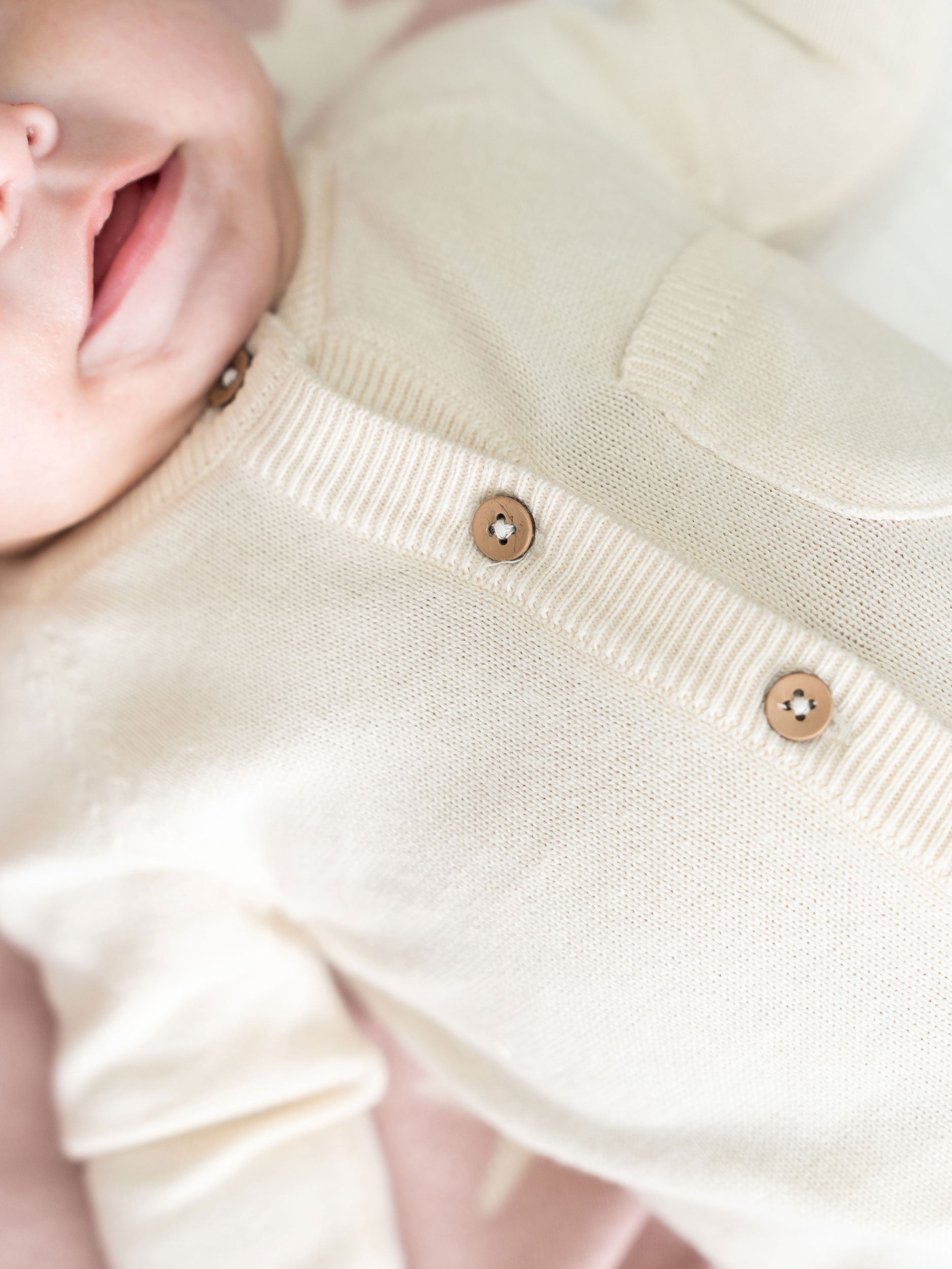 Milan Knit Organic Cotton Baby Pocket Jumpsuit Cream Detail