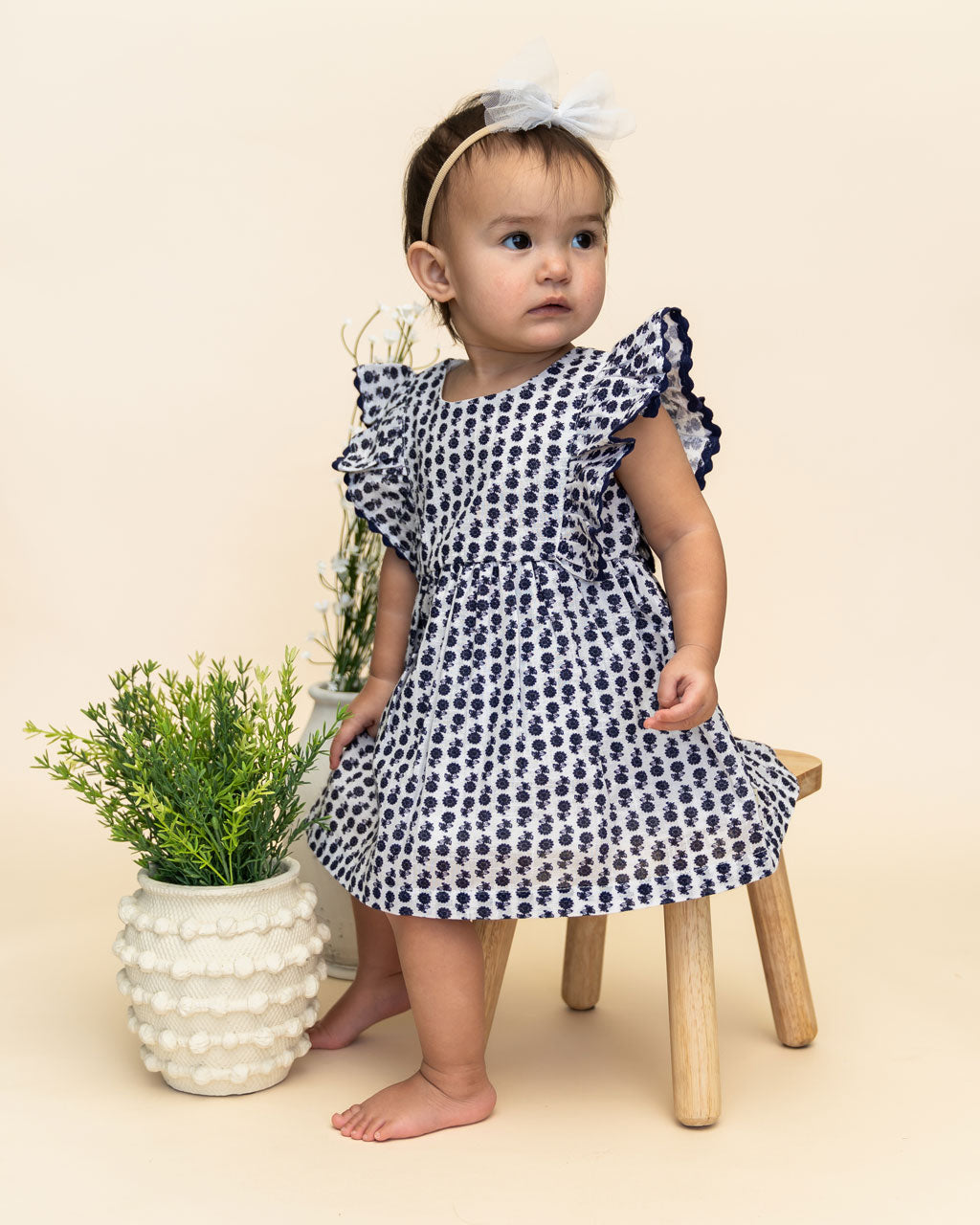 Jamie Blue Floral Baby Dress + Bloomer (Organic) Lifestyle Model